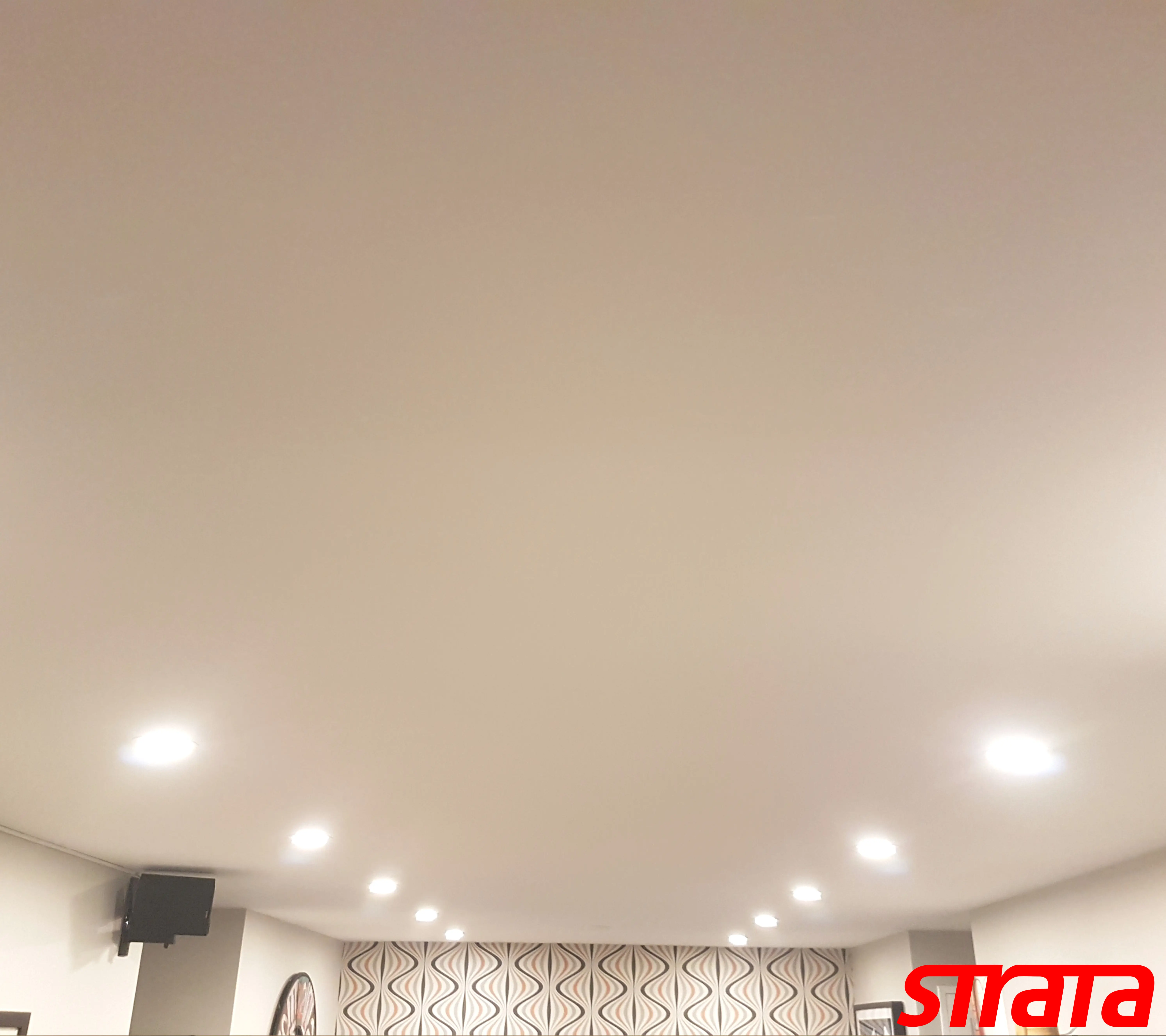 Dust-free popcorn ceiling removal in a downtown Toronto condo using Festool Planex HEPA extraction for smooth ceiling results.