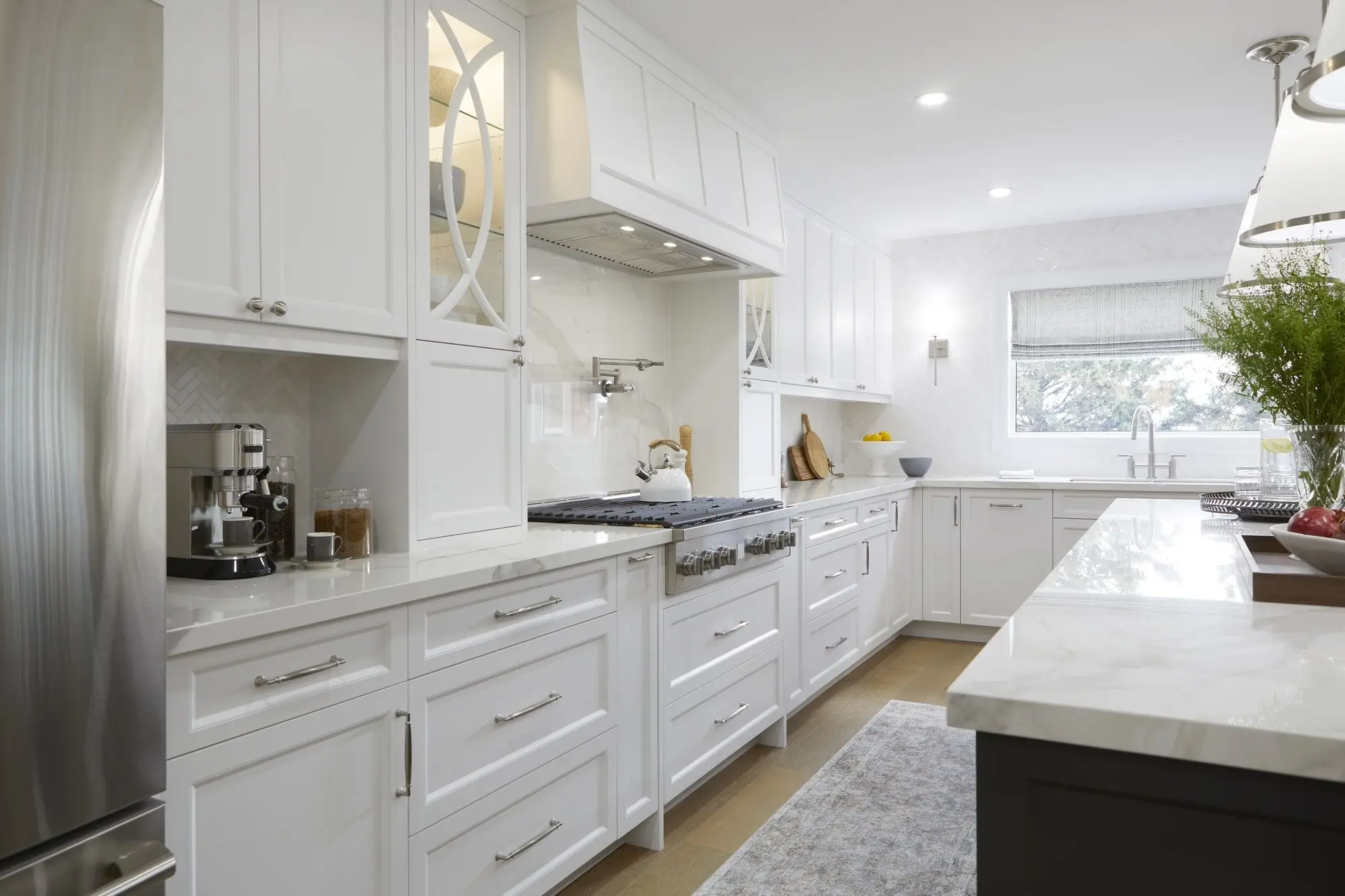 Kitchen renovation in Toronto with white cabinets and a bright modern layout.