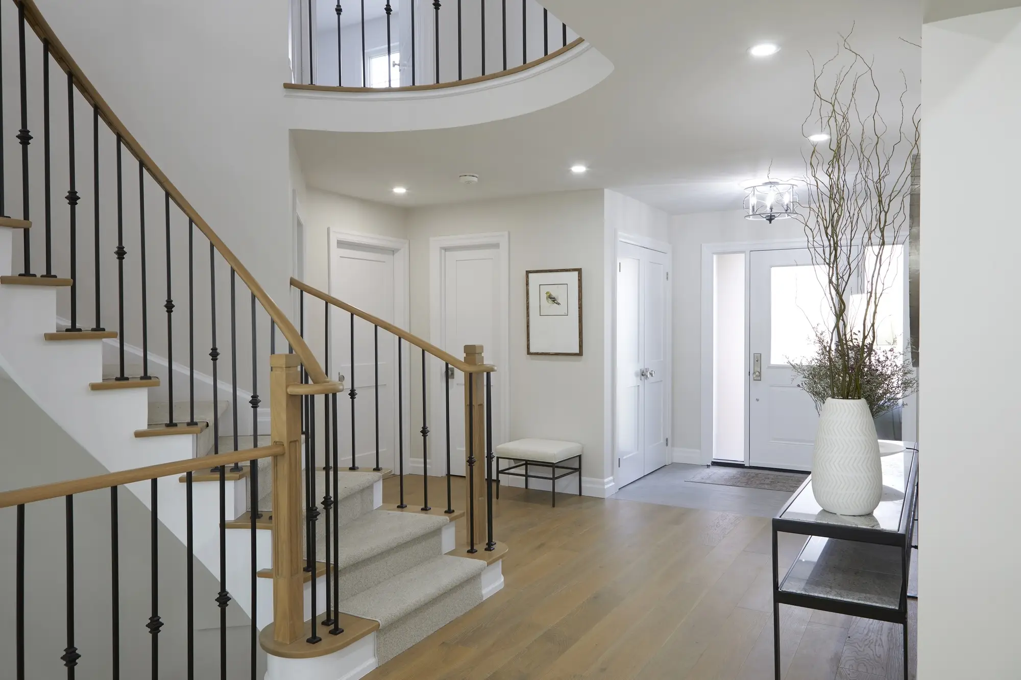 Modern iron railing staircase renovation in Toronto.