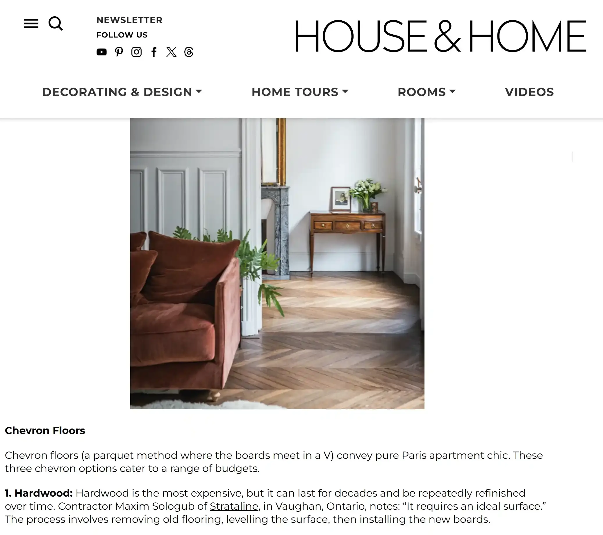 Premium interior with chevron hardwood and curated furnishings, featured in House & Home.